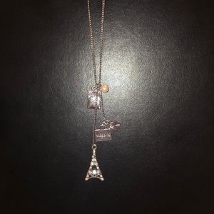 Necklace with shopping themed charms